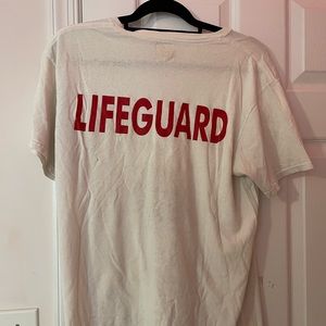 beige life guard shirt